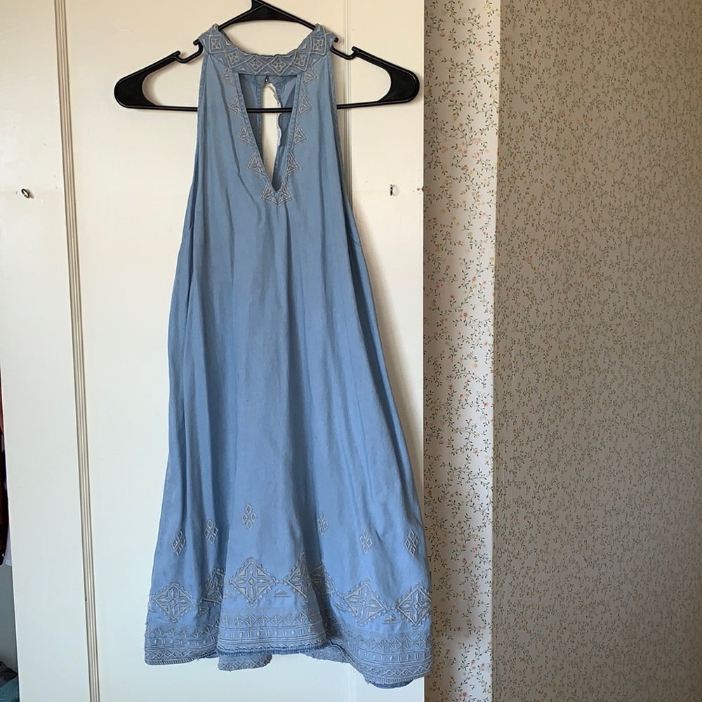 Blu pepper denim like dress with white embroidery. Size small. Worn 2x